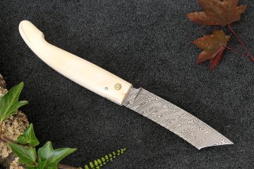 Couteau pliant Patriarche lame damas carbone manche ivoire phacochère