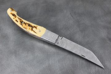Couteau pliant Baroudeur ivoire mammouth lame et mitres damas