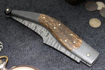 Grand couteau inspiration Navaja acier damas manche os de mammouth