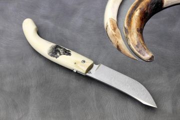 Couteau pliant chasse avec scimshaw Sanglier sur ivoire phacochère