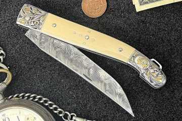 Couteau pliant design Laguiole gravure et incrustations or
